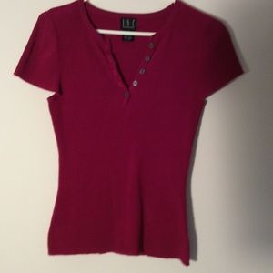 INC Sweater in a Beautiful Fuchsia Color. It Is 70% Rayon & 30% Nylon.